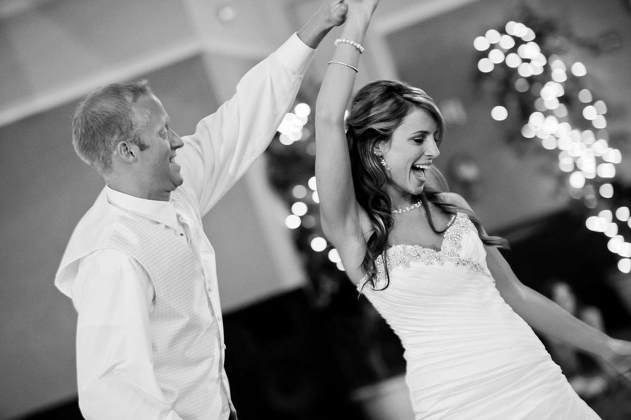 bride and groom dancing